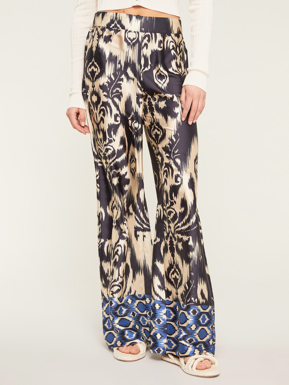 Flowing wide-leg trousers with ethnic pattern