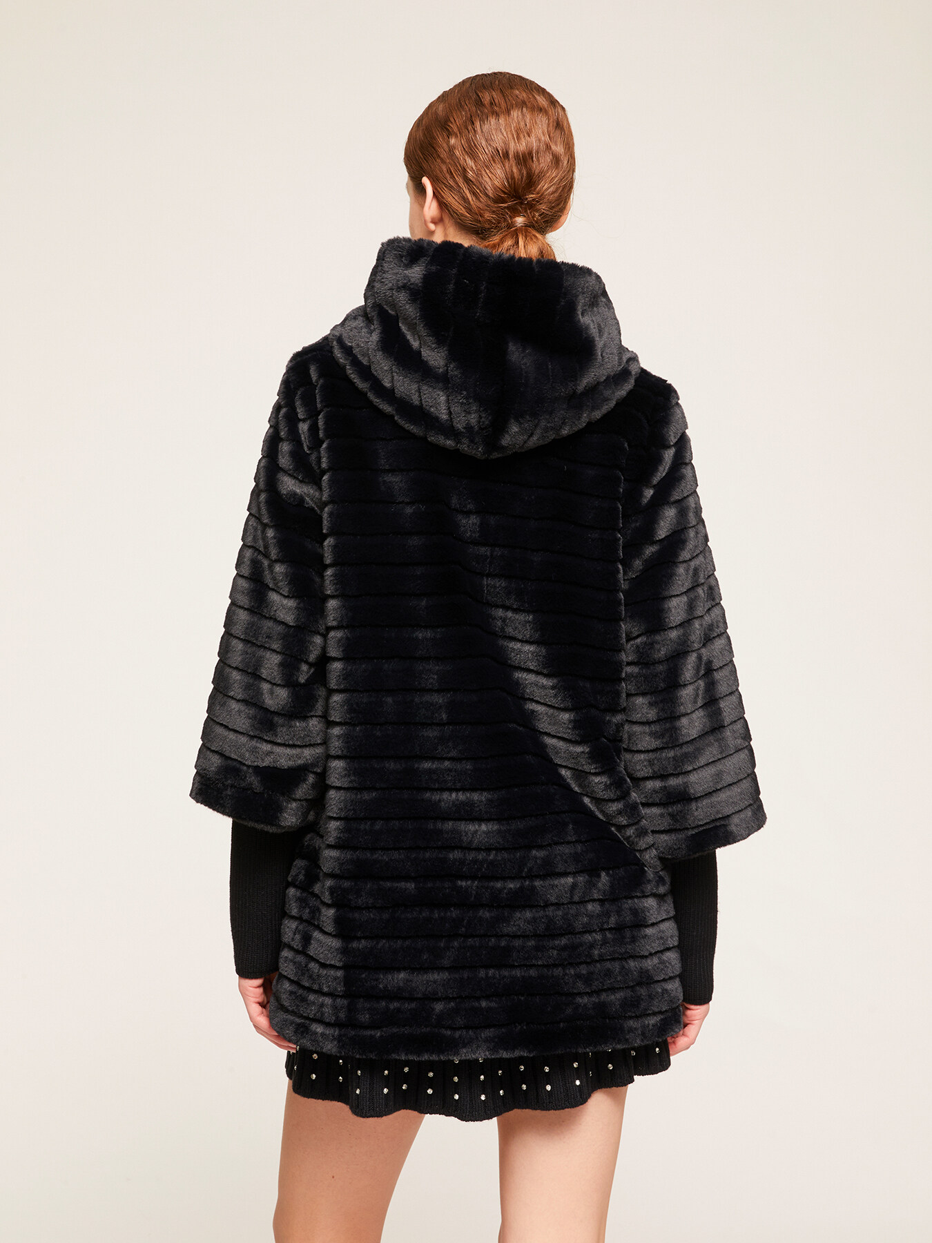 Long faux fur cape with knit cuffs image number 1