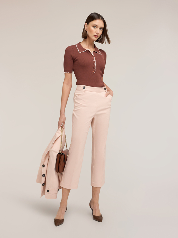 Polo aus feiner Strickware mit Bogenkante