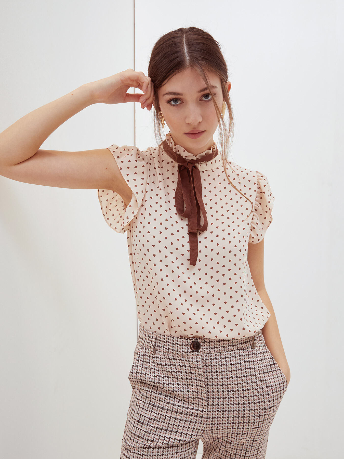 Heart pattern pussy bow blouse image number 0