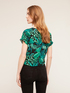 Jungle-patterned blouse with knot image number 1