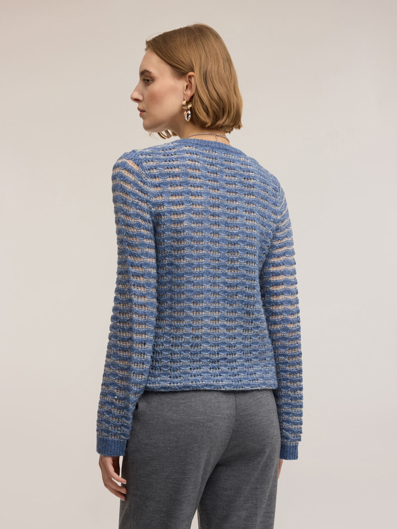 Perforated sweater with flare sleeves image number 1