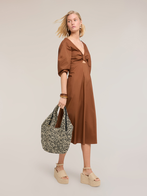 Flare dress with bow on the back