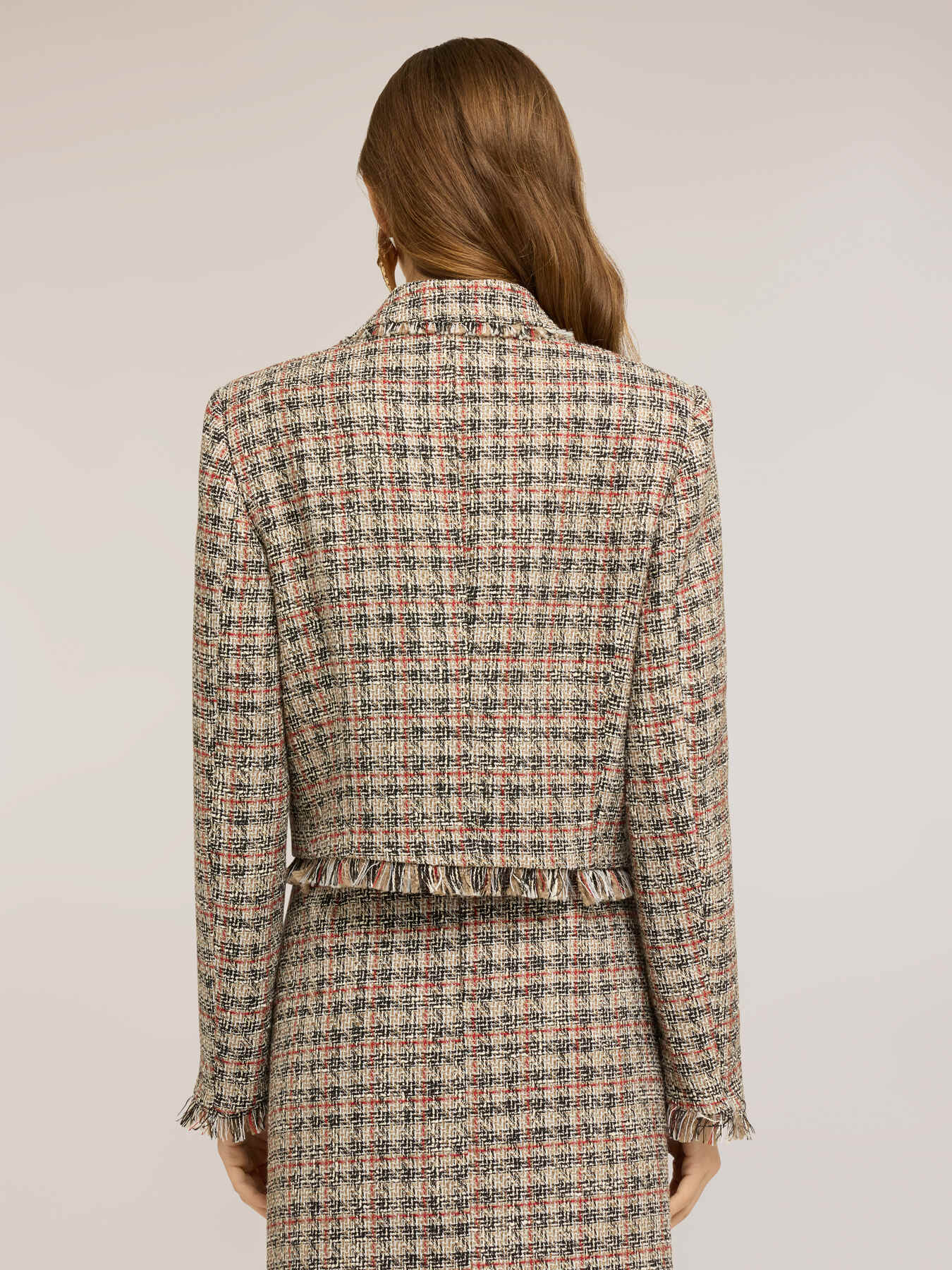 Short boucl&eacute; jacket with fringes and brooch image number 1