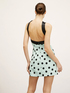 Polka dot patterned mini dress with bow image number 1