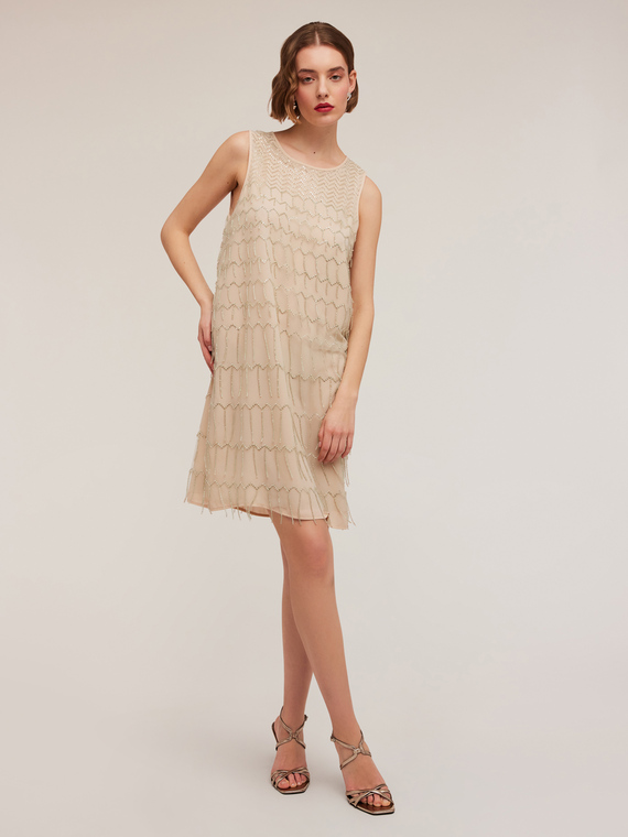 Embroidered dress with fringes