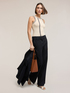 Sleeveless sweater with decorative stitching image number 3