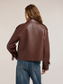 Trench corto doble botonadura con charreteras image number 1