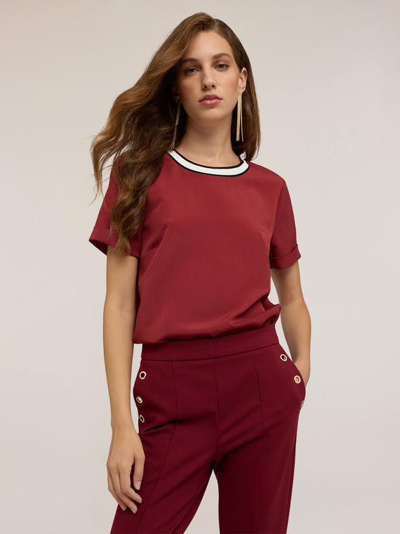 Blusa con bordo in maglia