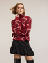 Rollkragenpullover mit Chevron-Muster und Pailletten image number 0