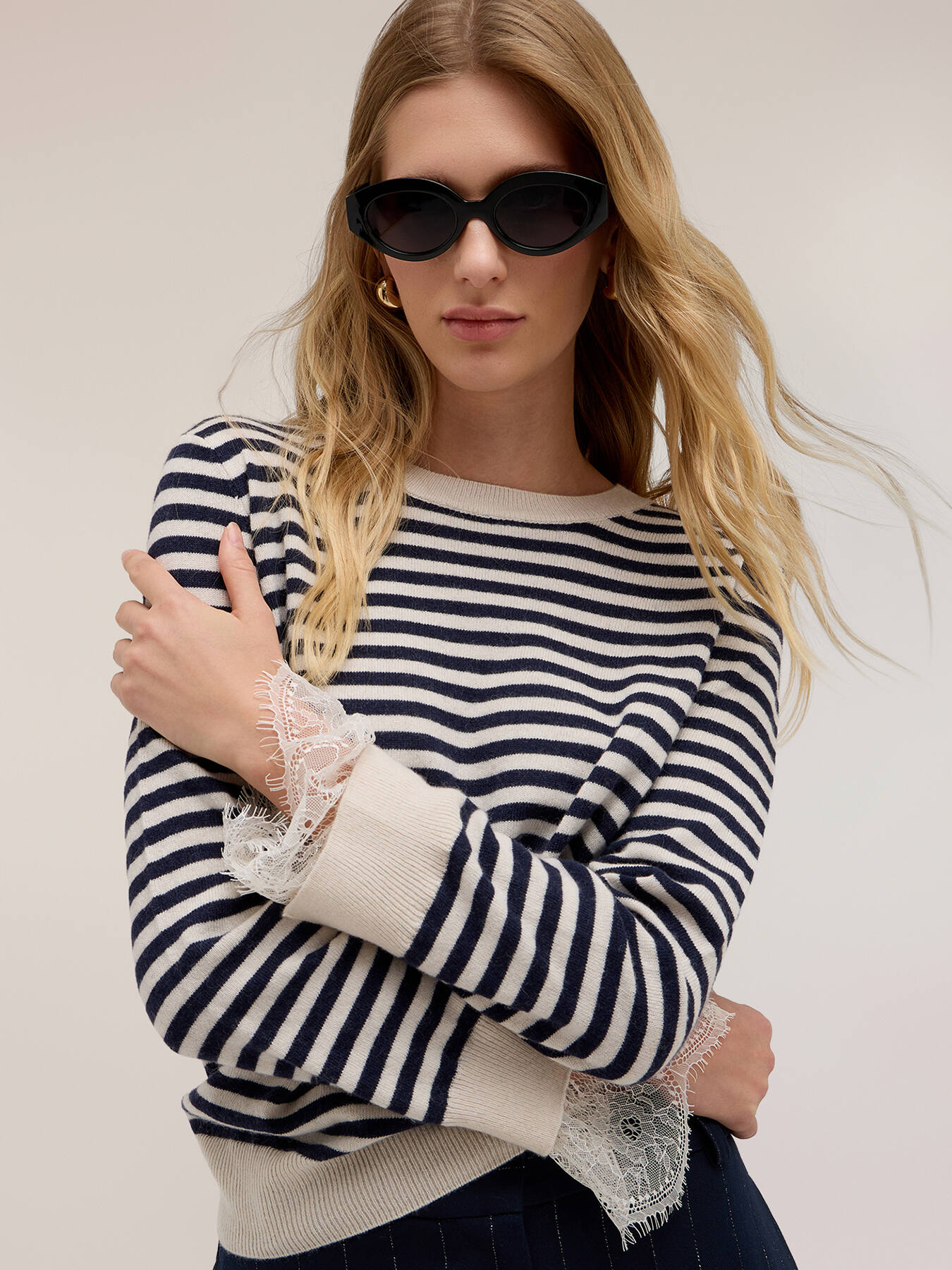 Striped sweater with lace trim on the cuffs image number 3