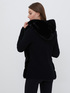 Faux fur winter jacket with knitted sleeves image number 1