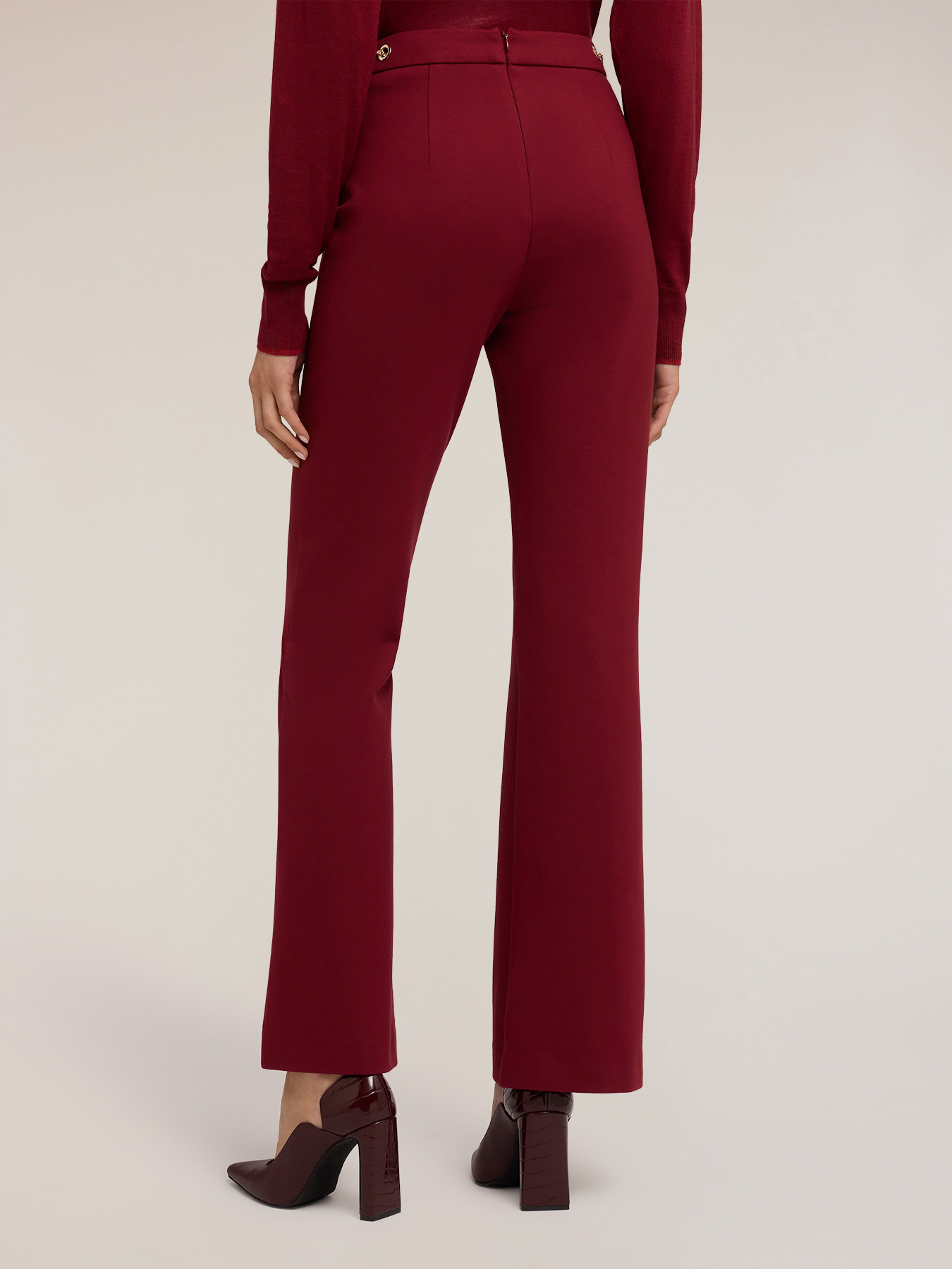 Flare pants with eyelet pattern image number 1