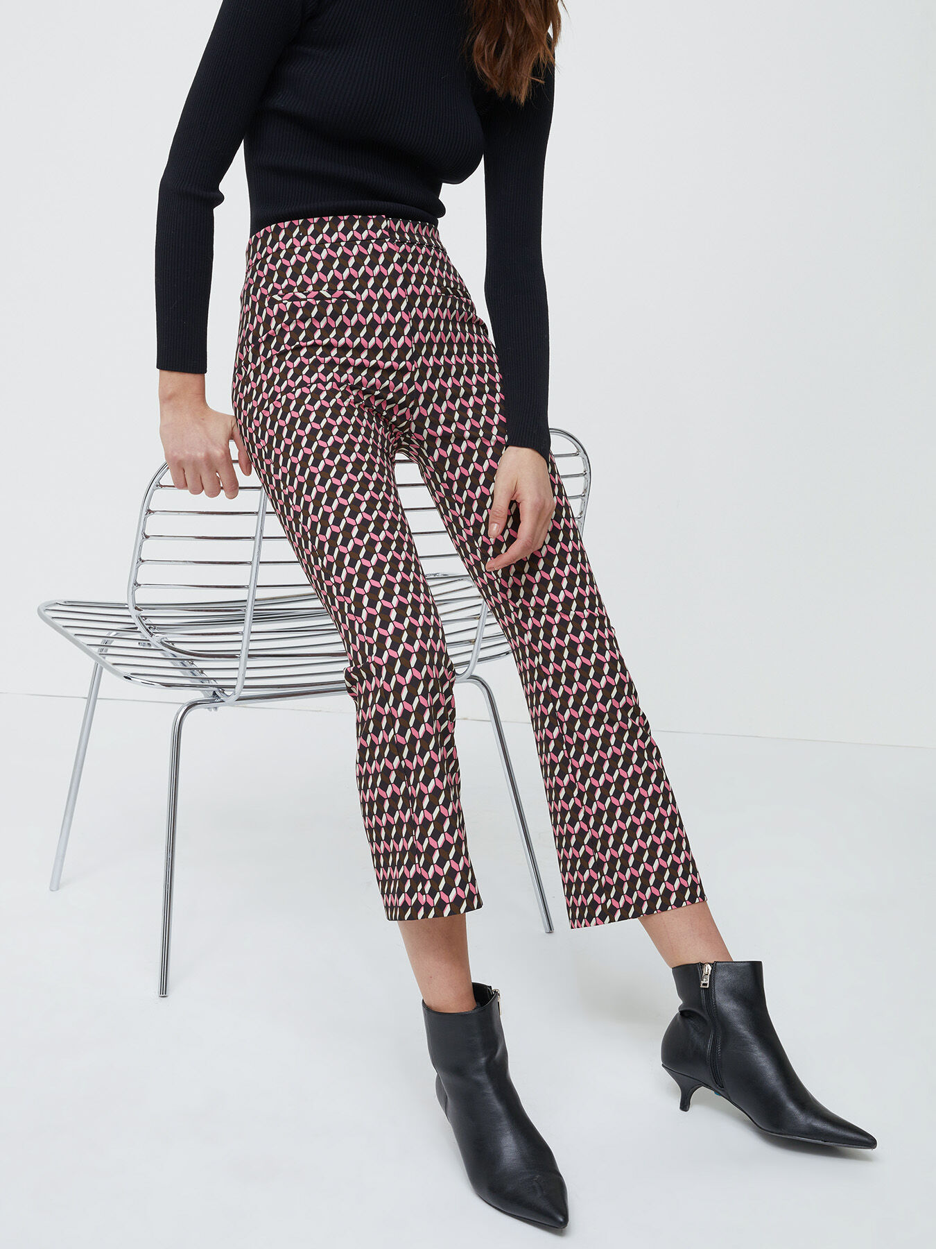 Geometric patterned flared trousers image number 0