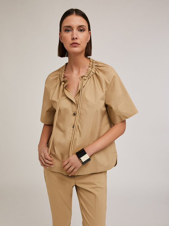 Shirt with drawstring