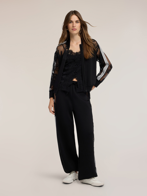 Jogging pants with lace inserts