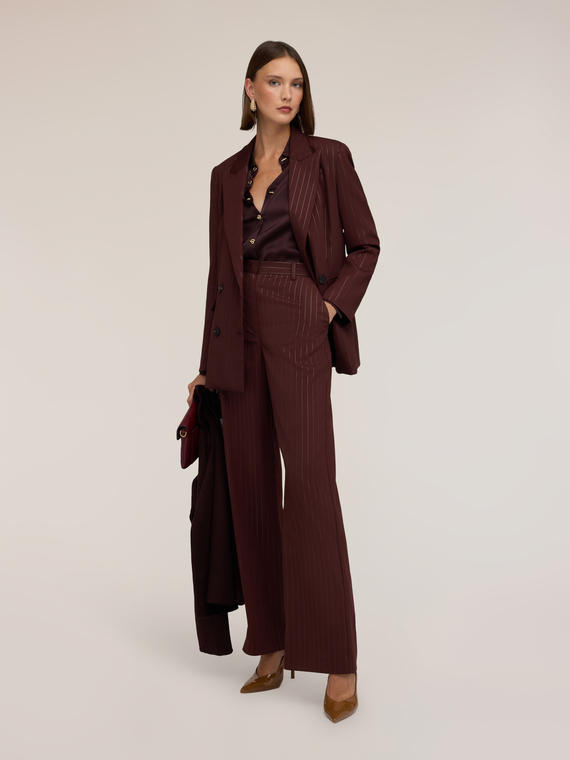 Pantalones palazzo de rayas con lurex