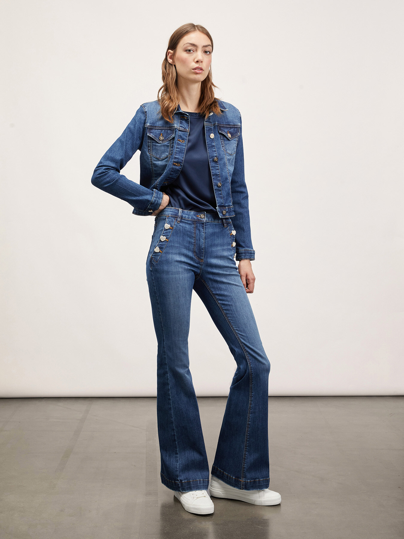 Flared jeans with button feature image number 3