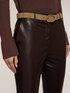 Pantalones slim fit en tejido revestido image number 3