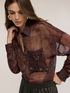 Chiffonbluse mit Paillettentasche image number 3