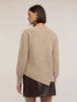 Asymmetrical cable-knit sweater image number 1