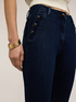 Skinny jeans with decorative buttons image number 3