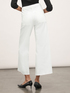 Cropped trousers with frayed hems image number 1