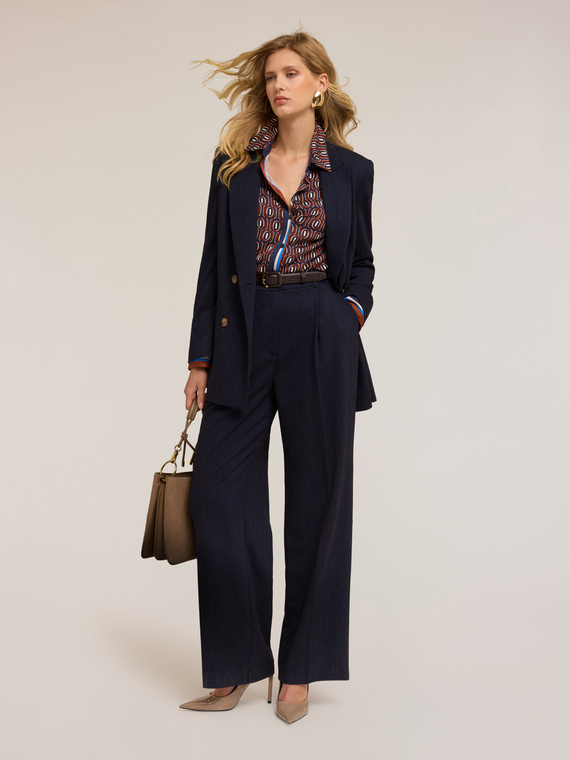 Pantalones fluidos anchos con pliegues