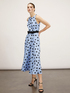 Polka dot patterned midi dress with bow image number 3