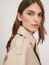 Short double-breasted trench coat in coated fabric image number 2