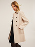 Coat with toggle fasteners image number 0