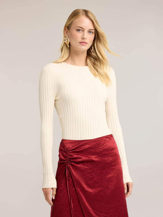 Flat rib knit sweater with flared cuff