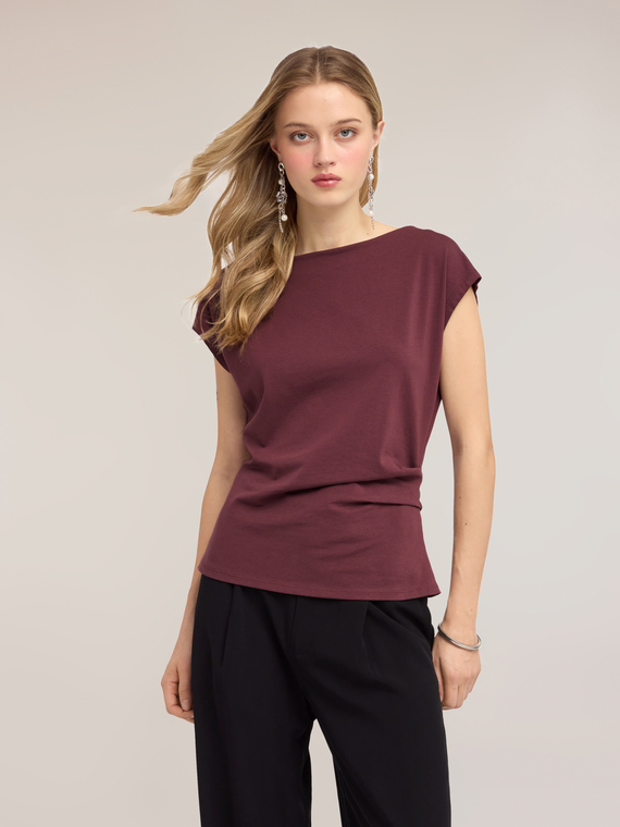 Top with side draping