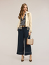 Biker jacket with hanging zip pulls image number 2