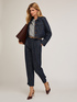 Trousers with denim effect strap on the hem image number 0