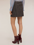 Pleated wrap-effect mini skirt image number 1