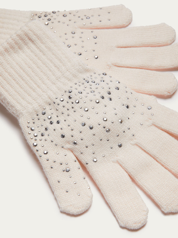 Knitted gloves with studs