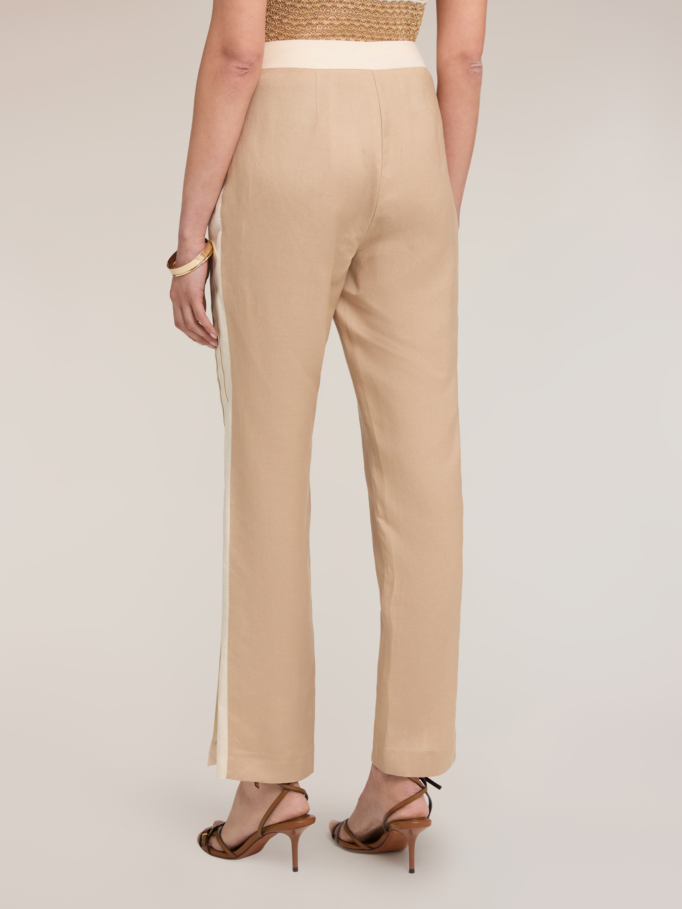 Trousers with piping and slit at the bottom image number 1
