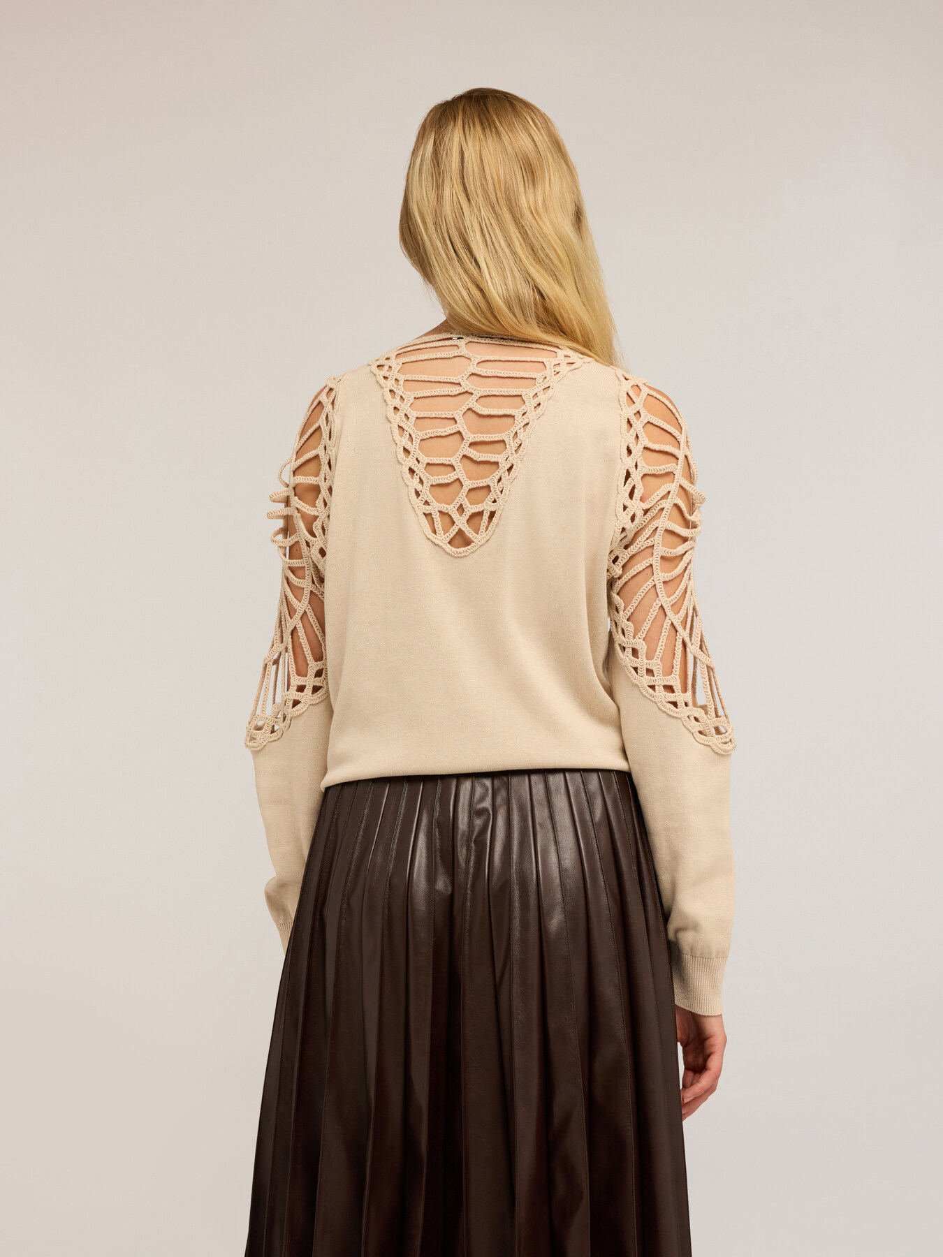 Sweater with macramé inserts image number 1