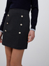 Mini skirt with button feature image number 2