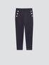 Skinny trousers with button feature image number 3