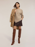 Asymmetrical cable-knit sweater image number 0