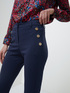 Skinny trousers with button feature image number 2