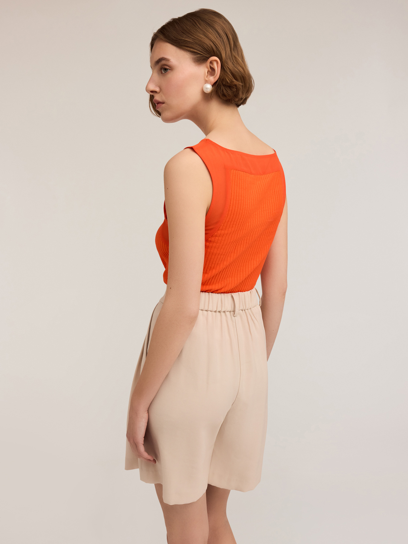 Top con bordi in georgette image number 1