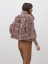 Fur-effect cape with knitted trims image number 1