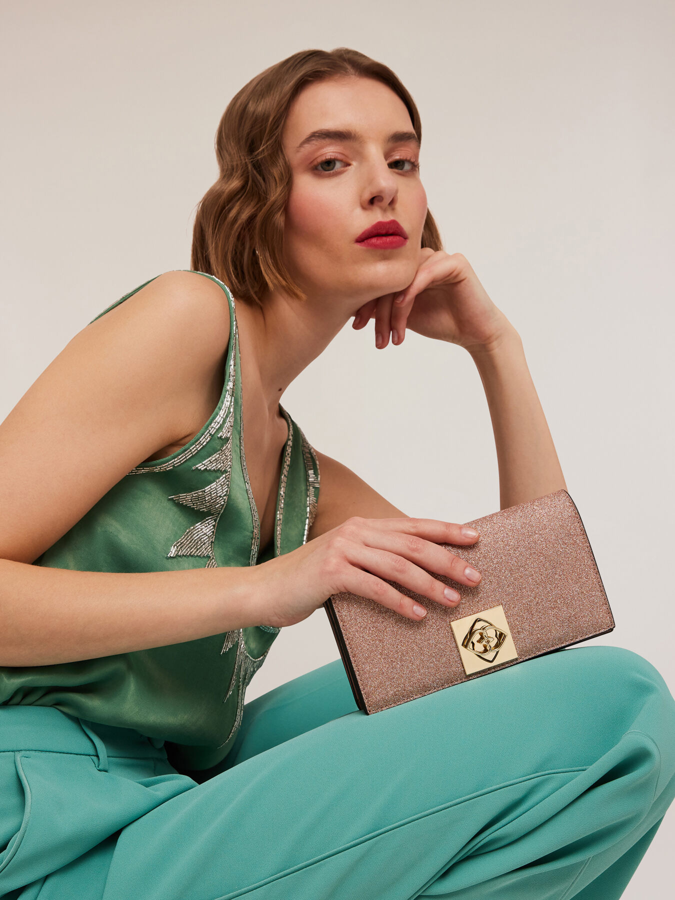 Wallet Bag in tessuto spalmato glitter image number 0