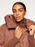 Trapeze cut down jacket with knitted inserts image number 0