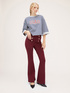 Milano knit fabric flare trousers button feature image number 3