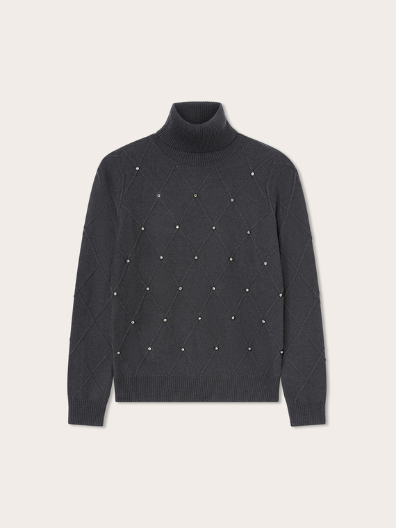 Rollkragenpullover aus Strickware mit Kristallsteinen