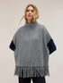 Knit poncho with fringe and high neck image number 0